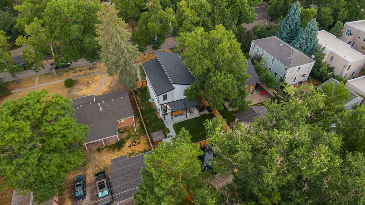 Aerial view of Denver pop top renovation home and tree-filled yard by Cillessen Construction