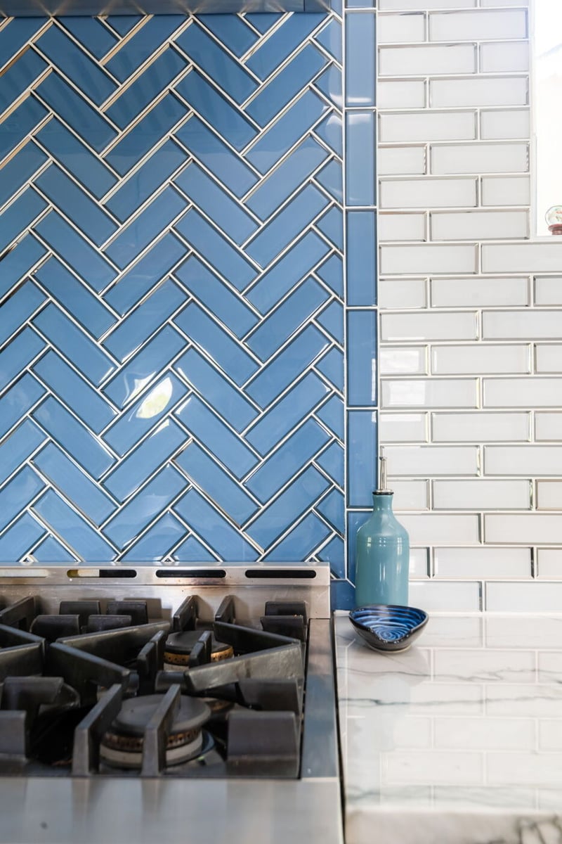 Denver pop top renovation kitchen detail with blue herringbone tile backsplash and white subway tile by Cillessen Construction