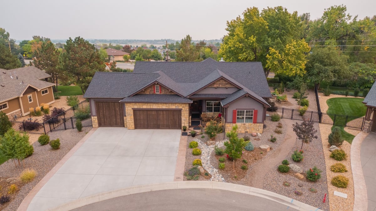 aerial view of landscaped custom home yard and driveway in denver colorado exterior renovation project