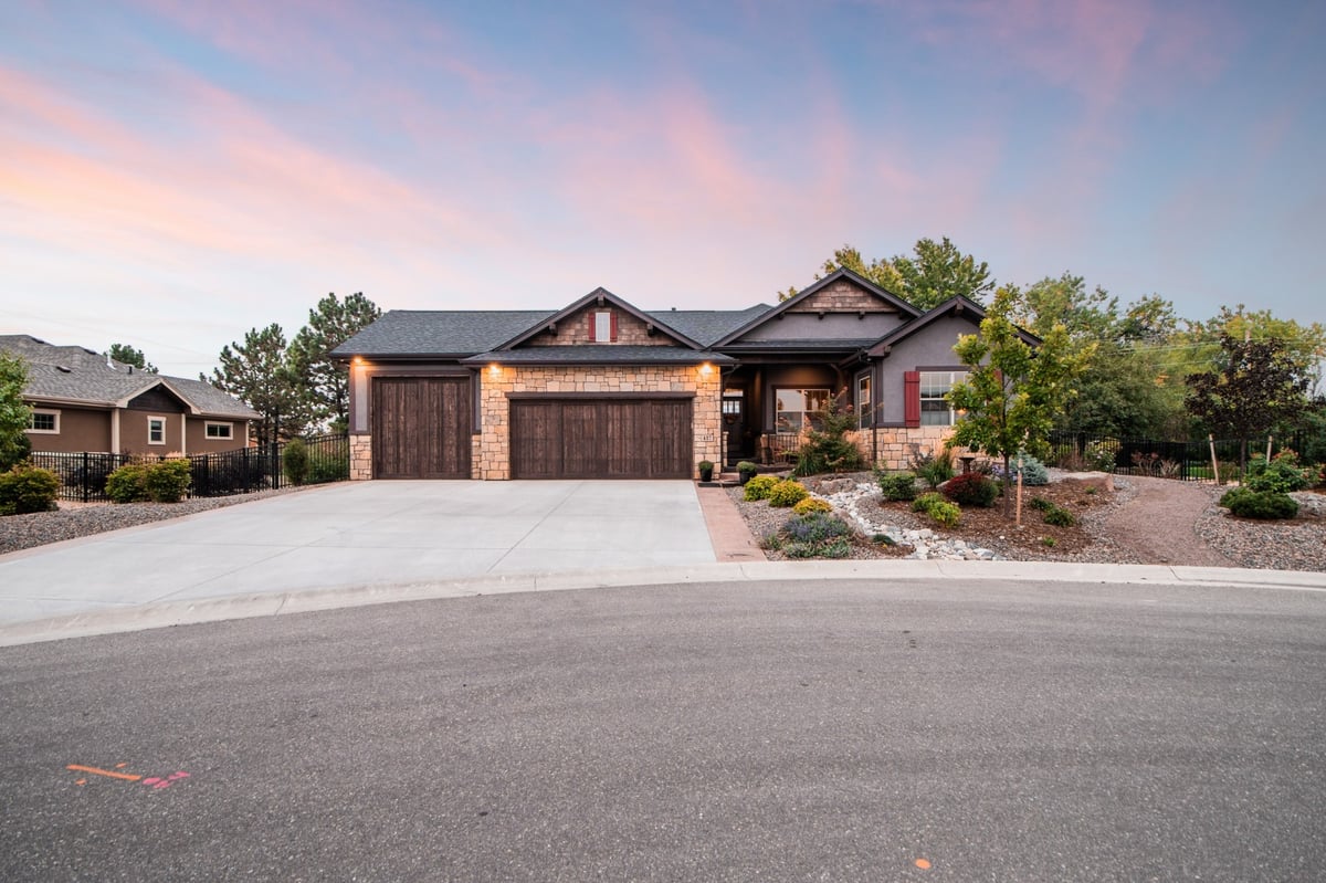 front yard landscaping with stone accents and driveway design in denver colorado exterior renovation