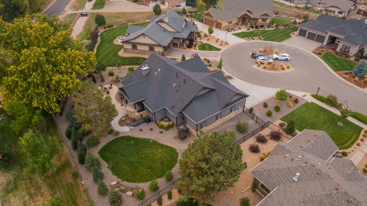 wide aerial of suburban homes and landscaping design in denver colorado exterior renovation setting