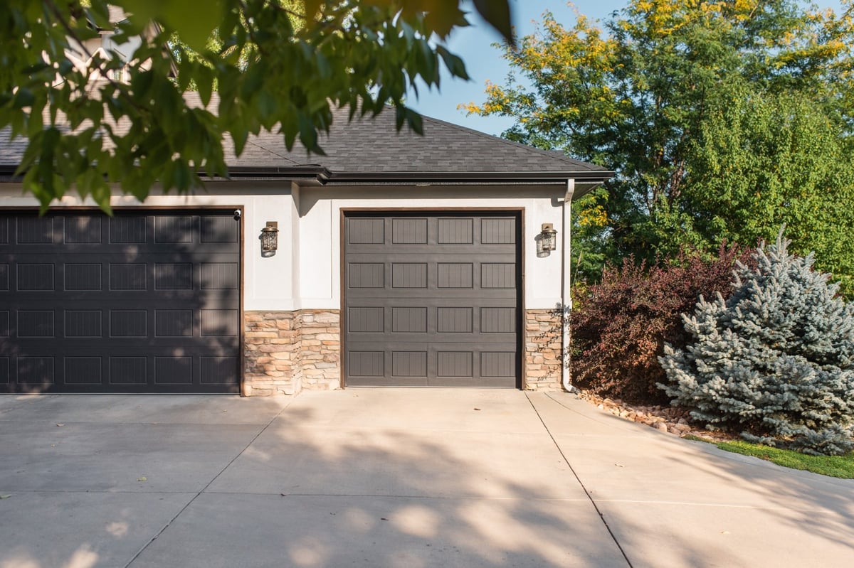 driveway view of home with landscaping exterior restoration roofing in denver colorado
