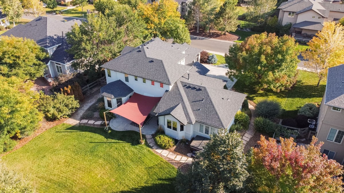 wide aerial shot of residential property with exterior restoration roofing in denver colorado and neighborhood street view