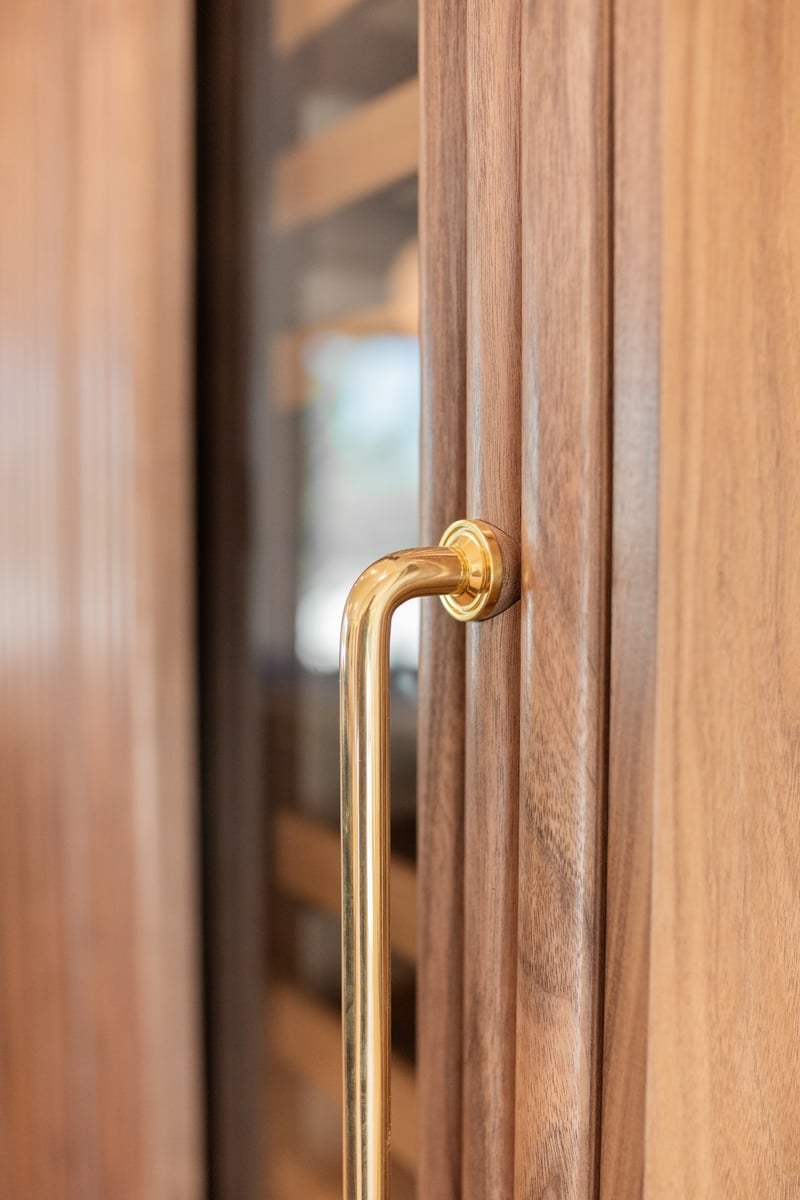brass cabinet hardware detail in applewood village pop top renovation