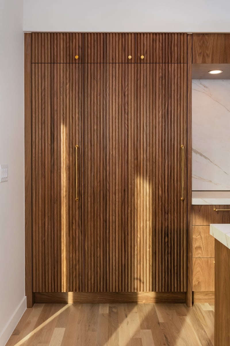 fluted walnut pantry cabinetry in applewood village pop top renovation