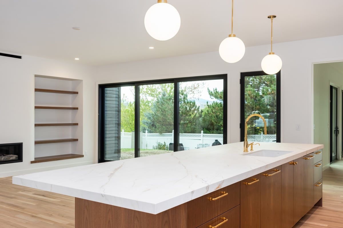 large waterfall kitchen island in applewood village pop top renovation
