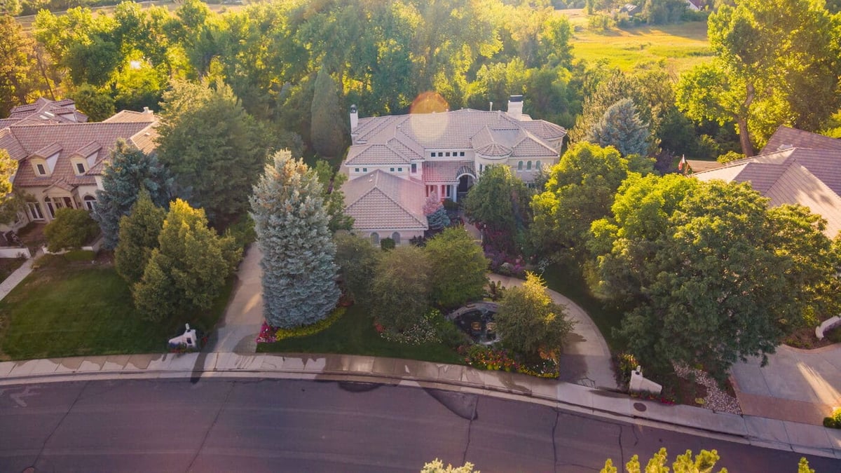 Aerial view of luxury home and landscaped front yard in Greenwood Village, CO, renovation by Cillessen Construction