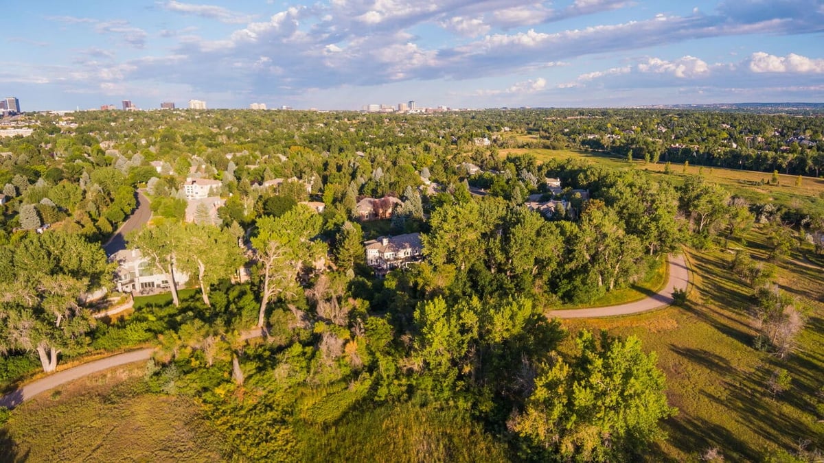 Aerial view of luxury home and surrounding trees in Greenwood Village, CO, renovation by Cillessen Construction