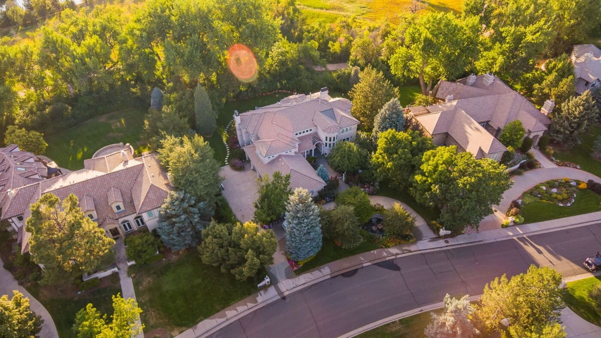 Aerial view of luxury homes and tree-lined streets in Greenwood Village, CO, renovation by Cillessen Construction.jpg