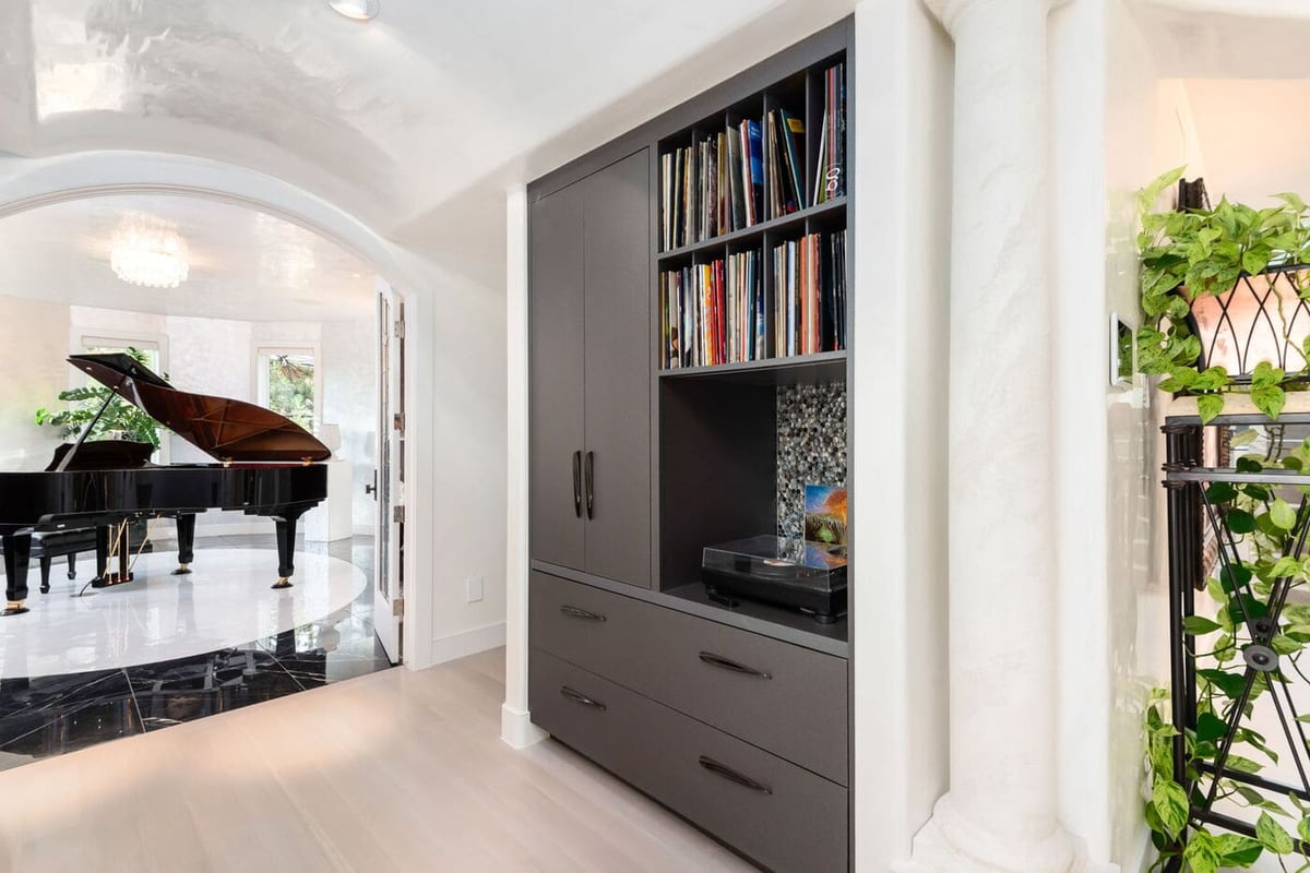 Greenwood Village, CO built-in cabinetry with record player and piano view by Cillessen Construction renovation