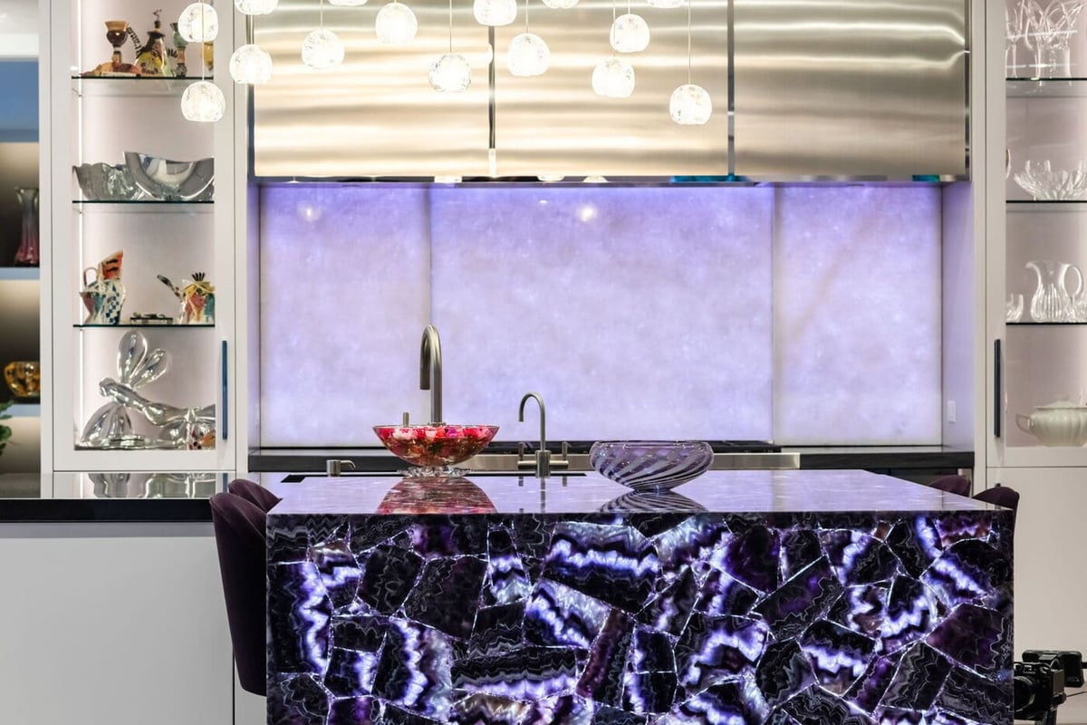 Greenwood Village, CO kitchen with illuminated backsplash and stone island by Cillessen Construction renovation