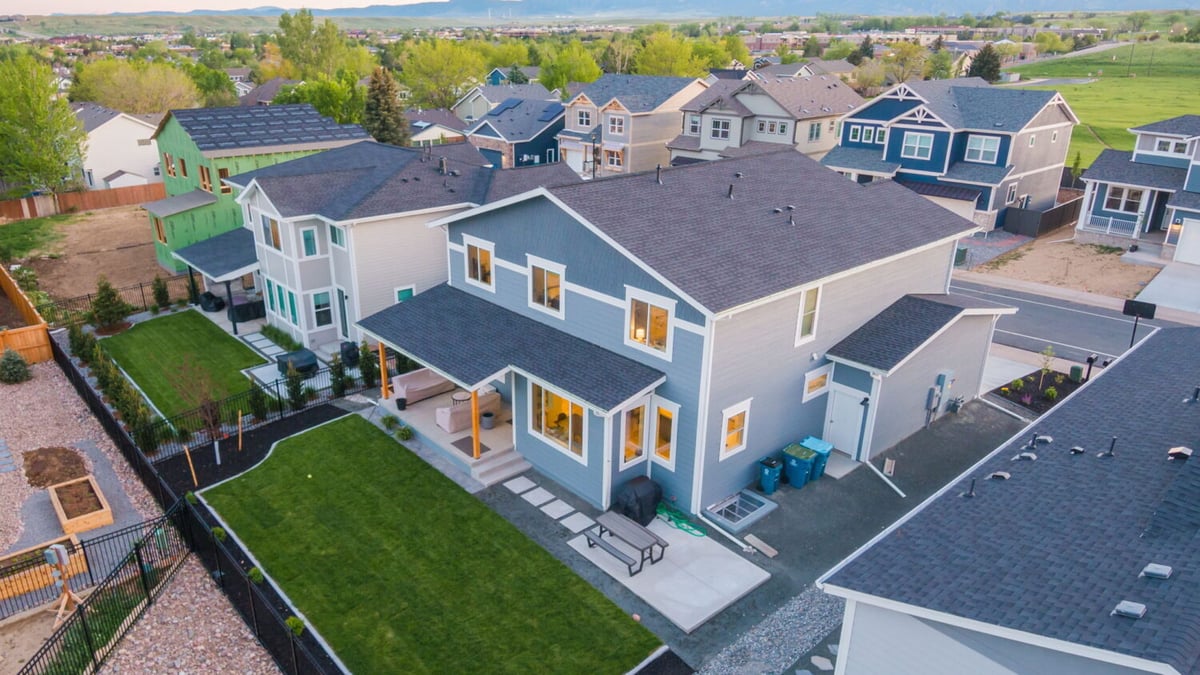 Aerial view of backyard and neighborhood of custom home in Louisville, CO by Cillessen Construction