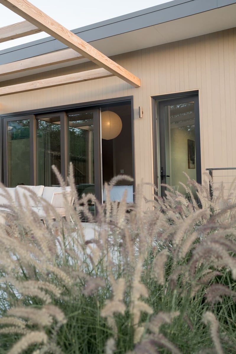 Close-up of patio doors and pergola on pop top renovation in Arvada, CO by Cillessen Construction