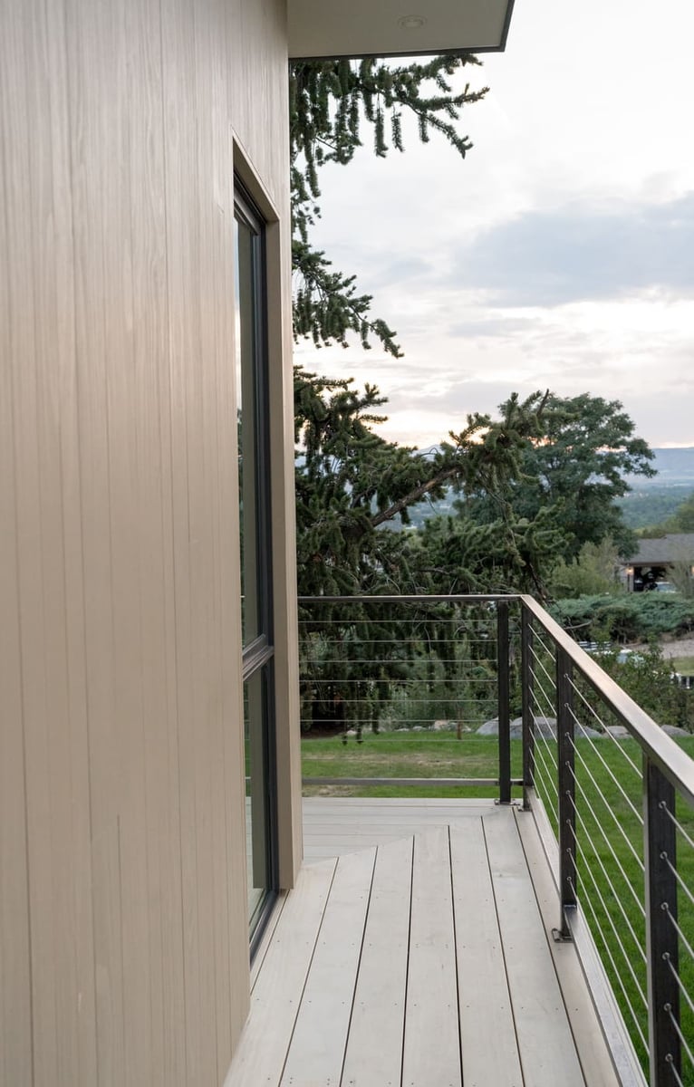 Upper deck with railing and mountain views in Arvada, CO pop top renovation by Cillessen Construction