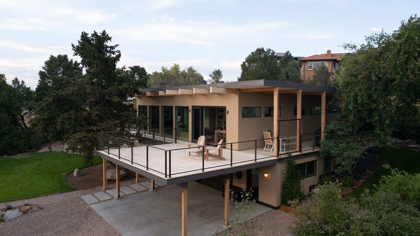 Wide aerial view of pop top renovation with expansive deck in Arvada, CO by Cillessen Construction